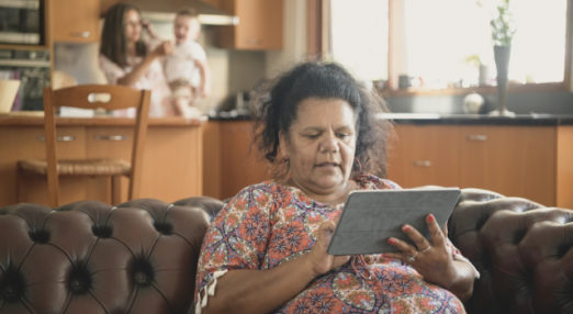 A woman uses her tablet